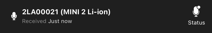 Example: "2LA00021 (MINI 2 Li-ion). Received: Just now." A Status icon is displayed to the far right.