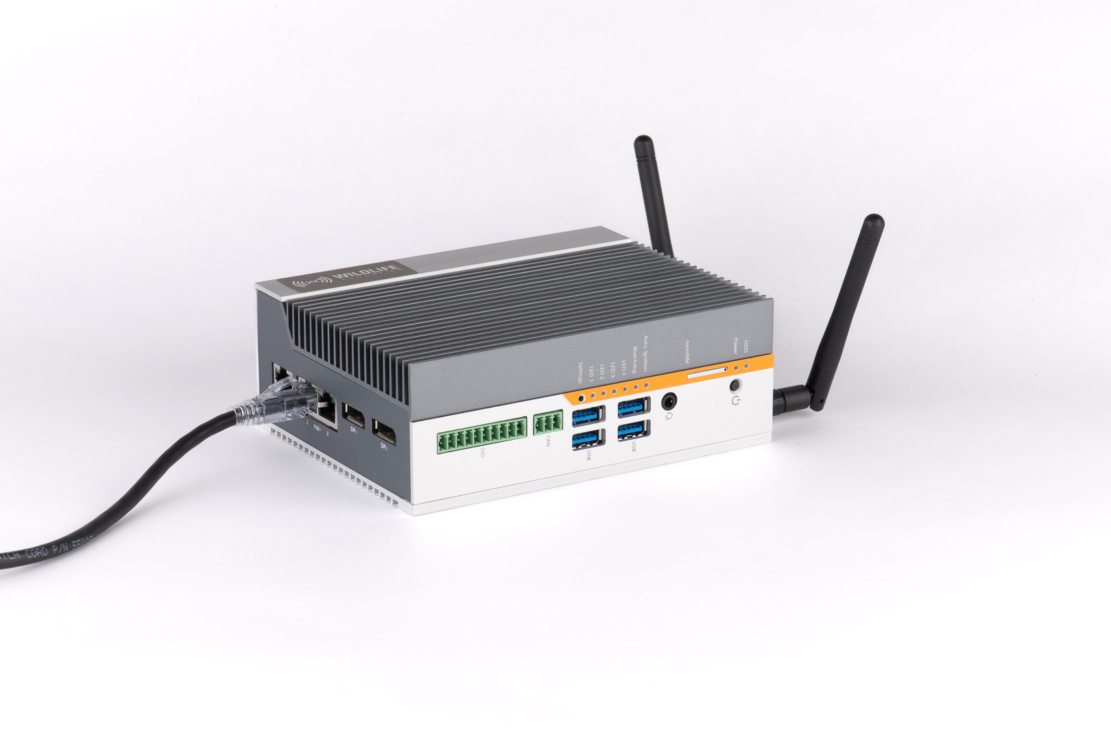 The SMART Controller is compact and sturdy. It features dual Wi-Fi antennae and a variety of inputs and outputs. The top surface largely consists of metal fins that dissipate heat.